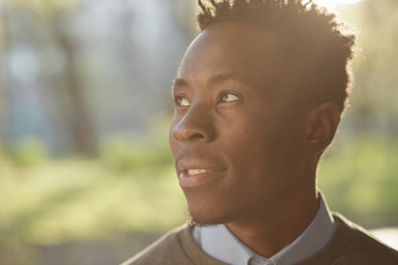 African american man portrait in sunny evening