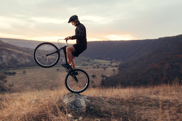 Male riding bicycle