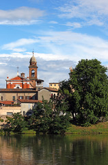 Fototapeta na wymiar church tower and buildings Rimini Italy