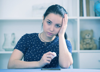 Girl waiting for phone call