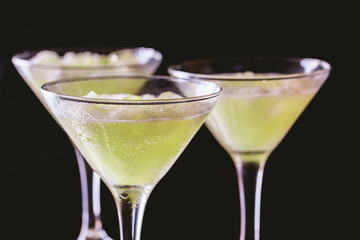 Classic daiquiri cocktail with lime, ice and mint