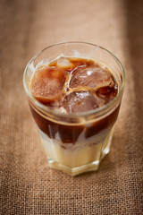Coffee in Hong Kong will stakanam in a glass , with ice.Coffee drink