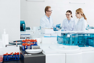 Positive group of scientists being high spirited
