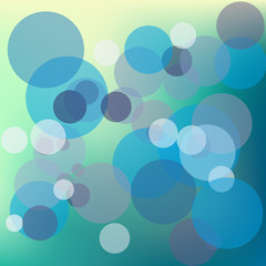 Colorful bokeh on blue background.