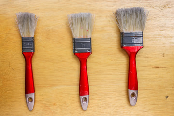 Paint Brush on a Wood Surface