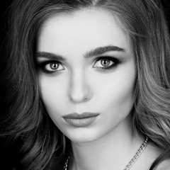 Fototapeta premium Fashion portrait of young beautiful woman with jewelry. Red hair girl. Perfect makeup. Beauty style girl with accessories