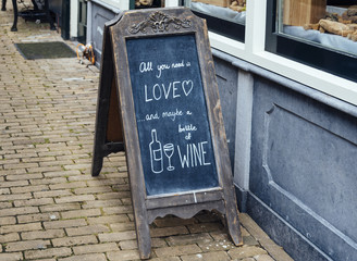 Funny message in slate of a bar