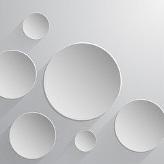 Abstract paper circles of white color in different sizes