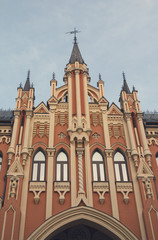 Fototapeta na wymiar Facade of a beautiful building with towers. Kiev, Ukraine
