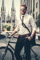 Businessman with bicycle