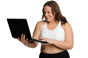 Naklejka premium Fat sporty woman with laptop