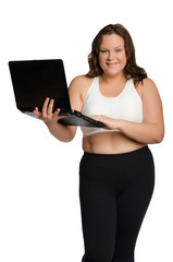 Fototapeta premium Smiling fat sporty woman with laptop
