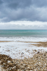 The sea and the rocks of the beach of Altea, Alicante, Spain.
