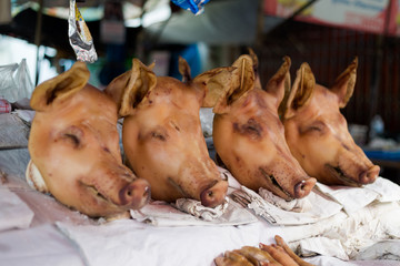 Pig heads on local market