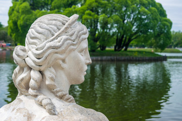 The Bird's isle at the Upper pond and the head of the scuplture of Sphinx in Tsaritsino park and reserve in Moscow, Russia
