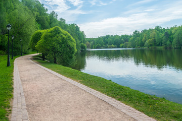 The pathway along the Upper pond in Tsaritsyno park and reserve in Moscow, Russia