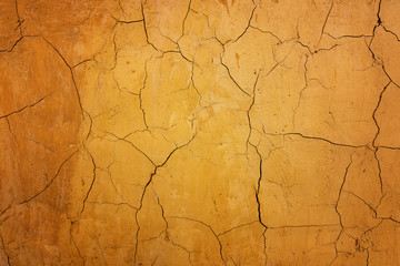 Brown clay earthen wall texture or background