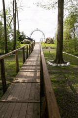 Religious entrance with arch against the sky with clouds
