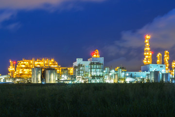 Refinery tower in petrochemical industrial plant with Twilight