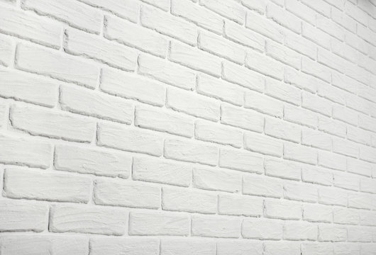 white brick wall, angle view, abstract background photo