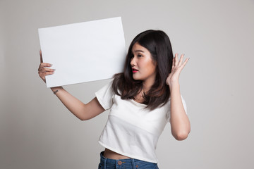 Young Asian woman  surprise with  white blank sign.