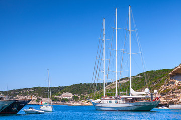 Fototapeta na wymiar Sailing ship leaves the port of Bonifacio, Corsica