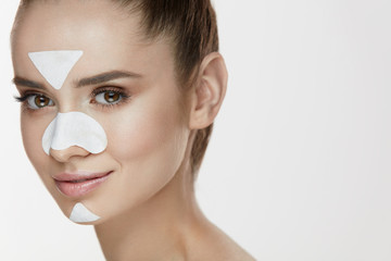Woman Beauty Face With Mask. Close Up Of Female With Patches