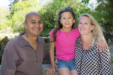 blond couple of Indian origin with their mixed daughter