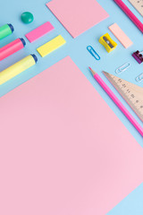 Office supplies on the blue background table