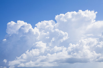 Obraz na płótnie Canvas White fluffy clouds in the blue sky.