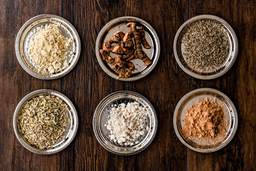 Various Spices and herbs on silver plate