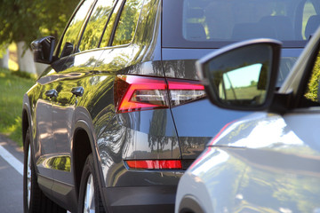 Two vehicles in motion at the suburban road stock photo
