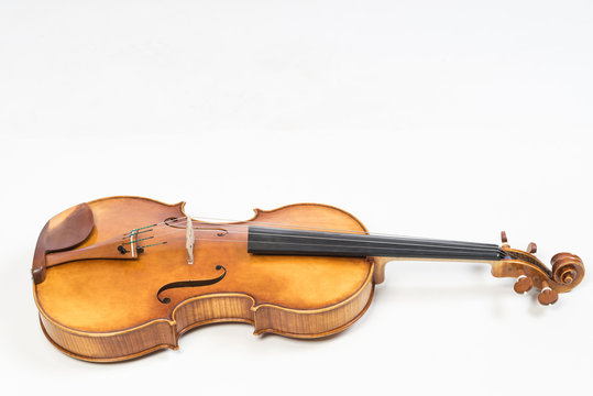 The old fiddle, isolated on white background. Viola, Instrument for classical music.