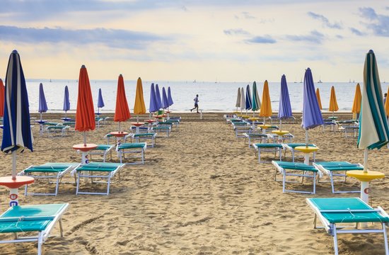 Running on the beach of Lignano Sabbiadoro, Italy