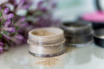 Close-up of mineral eye shadow hailayter and pressed shadows. Suitable for sensitive skin, do not cause allergies, light and fine make-up composed of entirely natural products. Concept fashion beauty.