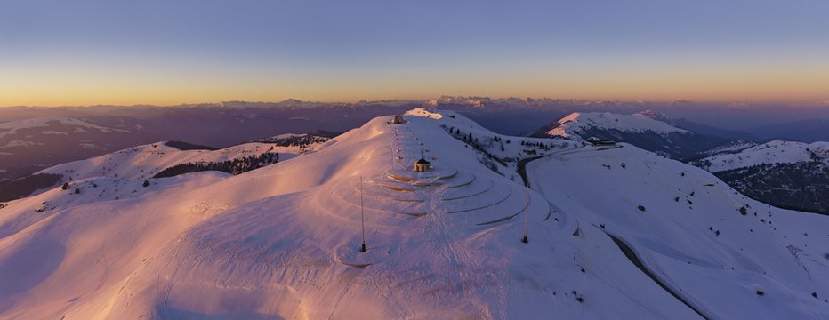 Aerial view of Military war memorial on the summit of Monte Grappa at sunset, Italy