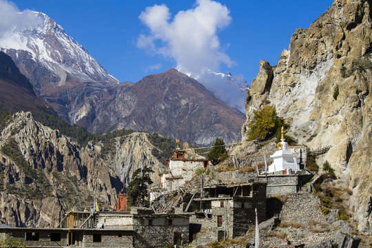 Traditional stone build village of Manang. Mountains in the background. Annapurna area, Himalaya, Nepal