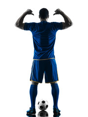 one caucasian soccer player man standing Rear View pointing in silhouette isolated on white...