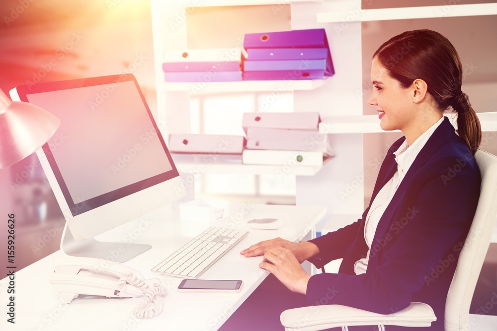 Poster composite image of smiling businesswoman working on computer