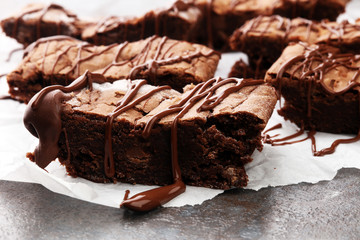 homemade chocolate brownies on grey background