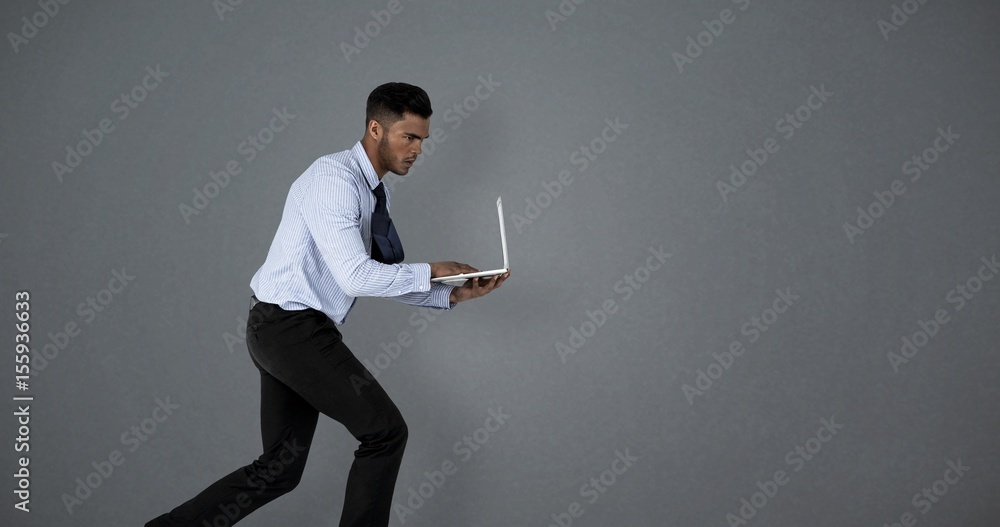 Poster composite image of businessman using laptop while running