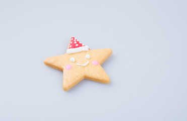 cake decoration or star shape christmas cookies on background.