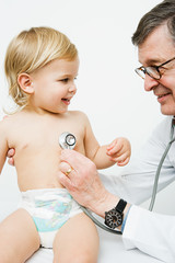 Little boy and doctor with stethoscope