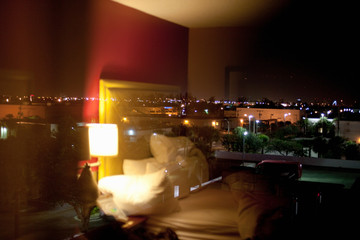 Hotel room at night © Image Source RF