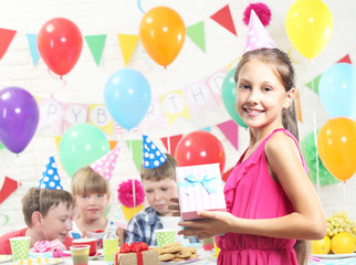 Fototapeta premium Happy childrens having fun at birthday party