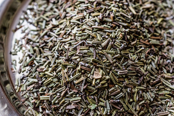 Dried Rosemary on silver plate. (biberiye)