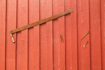 Old work tools hanging on wall