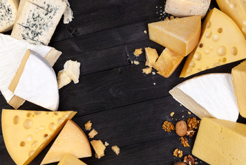 Various types of cheese. Top view. Copy space.