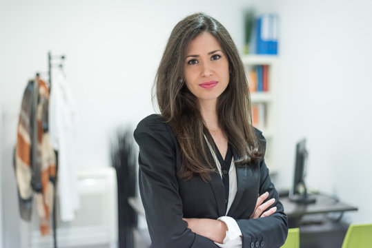 psychologist businesswoman smiling portrait in a office
