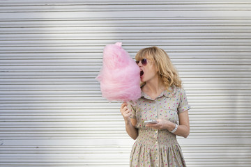 woman with cotton candy on the street